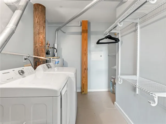 a utility room with dryer and washer