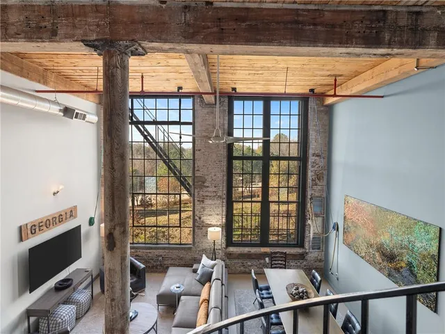 a white toilet sitting next to a shower curtain