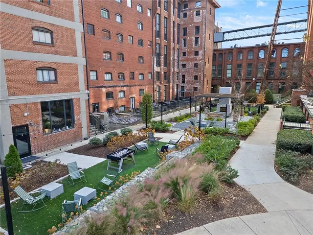 a view of pool with outdoor seating