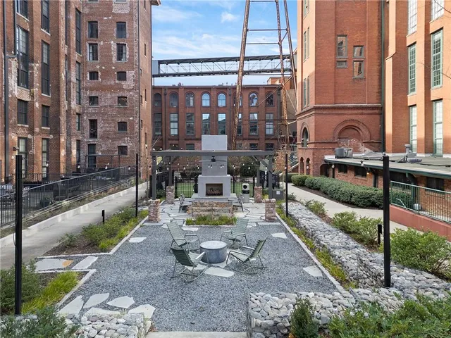 a view of a pathway with buildings