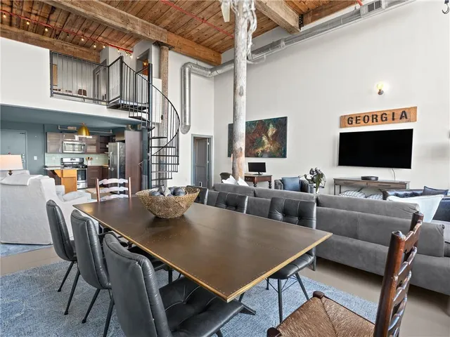 a view of a dining room with furniture