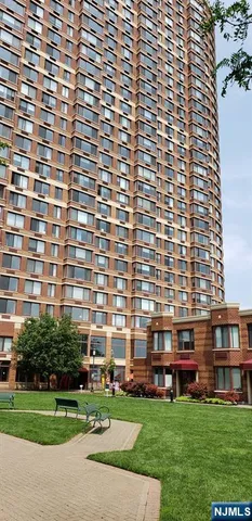 a view of a building with a garden