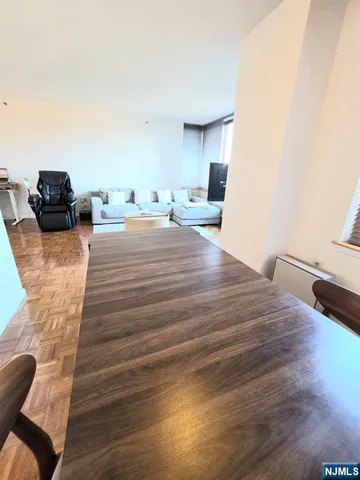 a bed room with a bed and a television