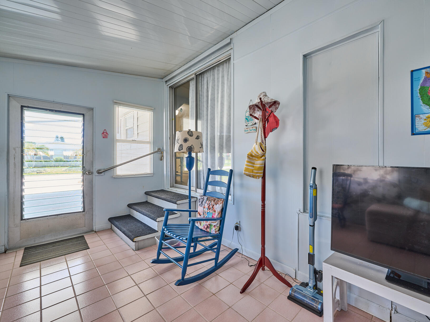 6977 Southeast Delegate Street Hobe Sound, FL 33455 - Photo 41 of 60 a view of a livingroom with furniture and window