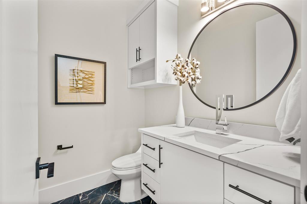7210 Robin Road Dallas, TX 75209 - Photo 27 of 39 Half Bathroom