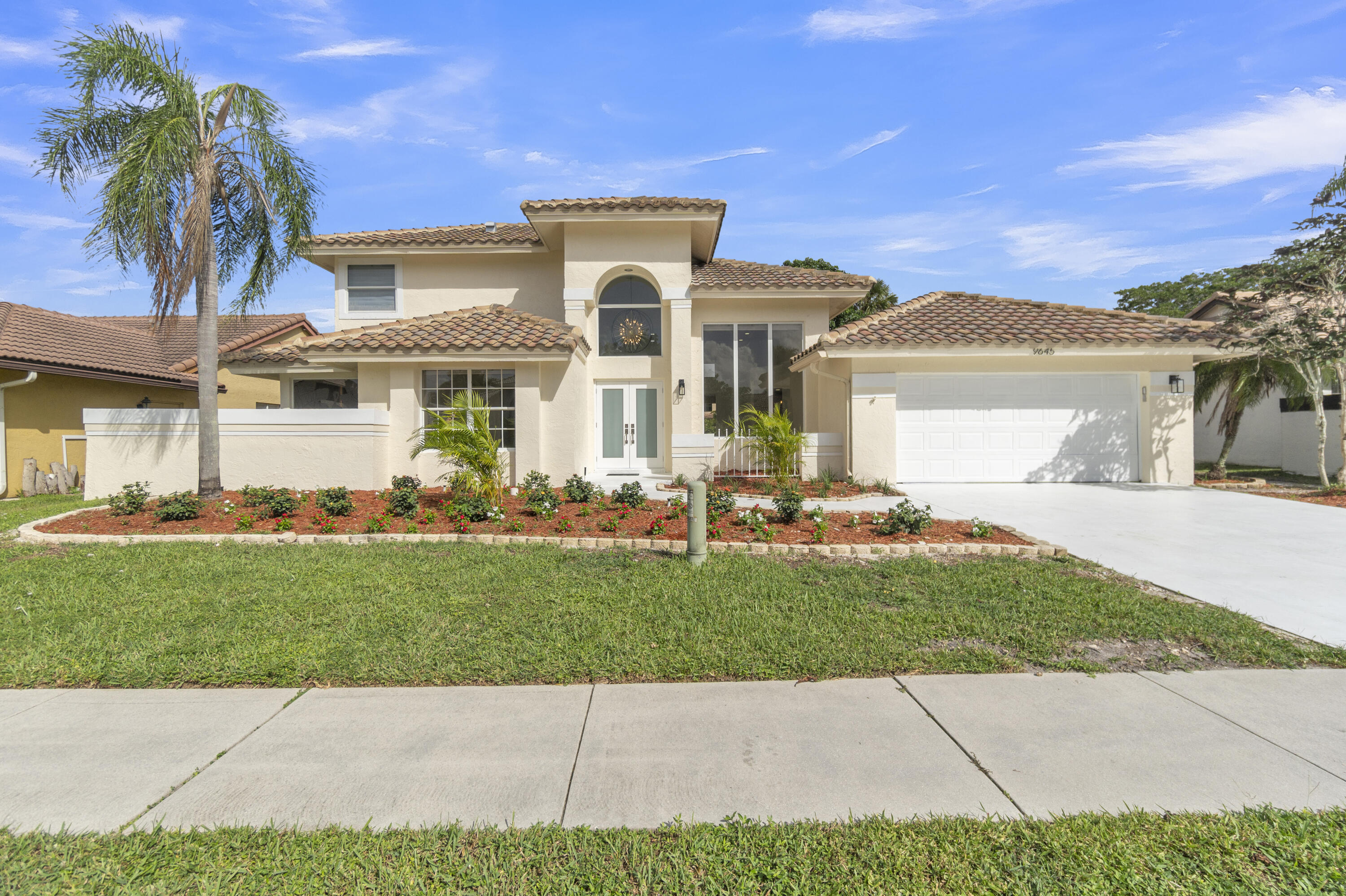 9645 Carousel Circle North Boca Raton, FL 33434 - Photo 1 of 39 Front of the house