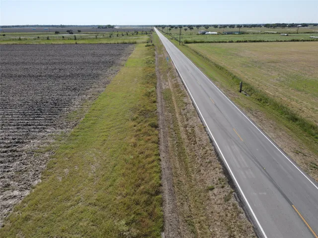 a view of a balcony with lake and mountain in the back