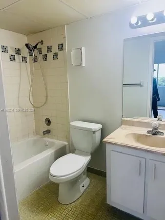 $295,000 | 9351 Fontainebleau Boulevard, Unit B409, Miami, FL 33172