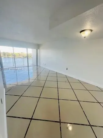 $295,000 | 9351 Fontainebleau Boulevard, Unit B409, Miami, FL 33172