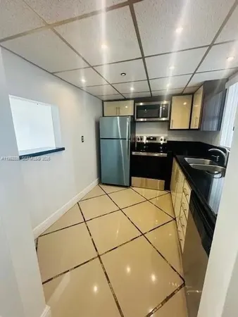 $295,000 | 9351 Fontainebleau Boulevard, Unit B409, Miami, FL 33172