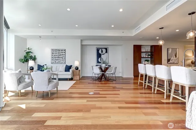 a view of a living room and dining room