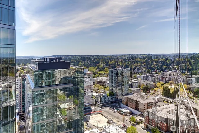 a view of a city with tall buildings