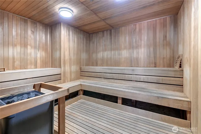 a bathroom with a bathtub and shower