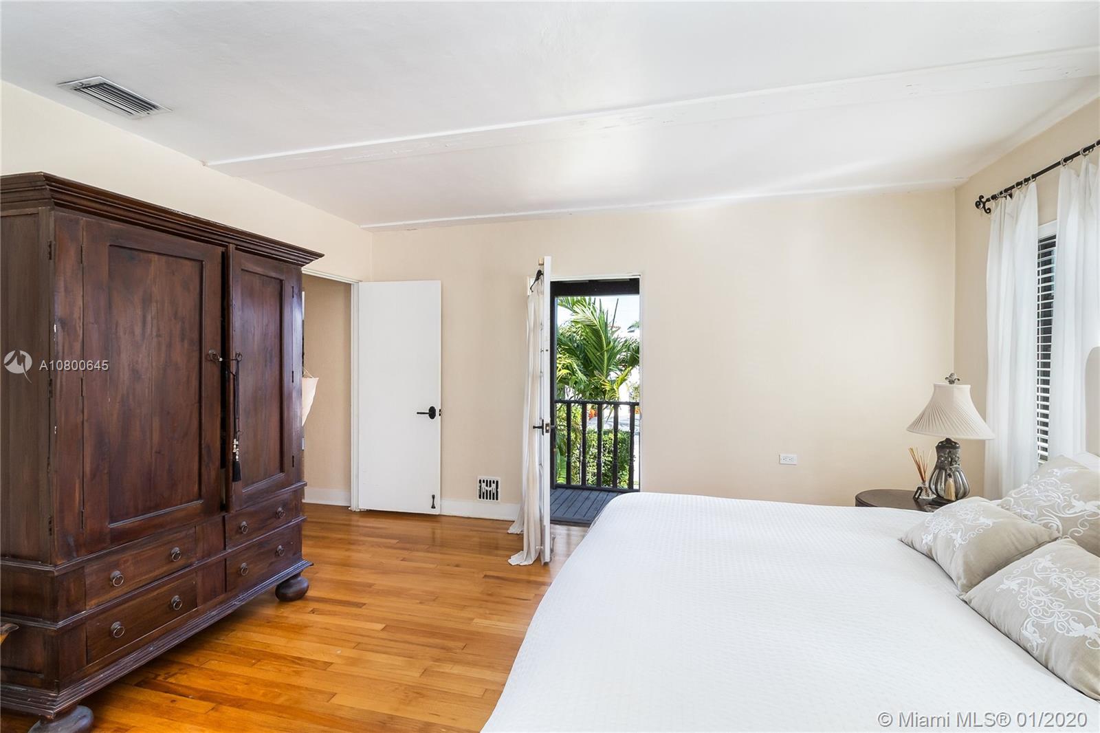 4770 Alton Road Miami Beach, FL 33140 - Photo 14 of 24 master bedroom with balcony