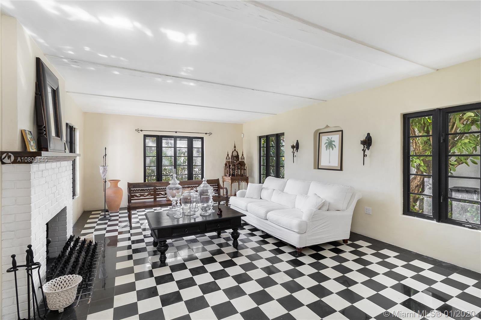 4770 Alton Road Miami Beach, FL 33140 - Photo 5 of 24 livingroom with working fireplace