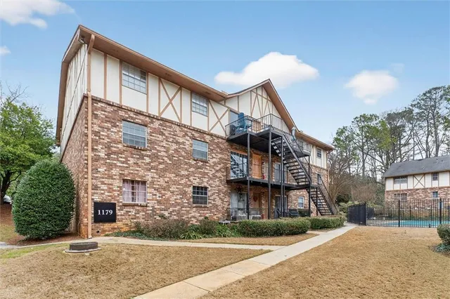 front view of a building with a yard