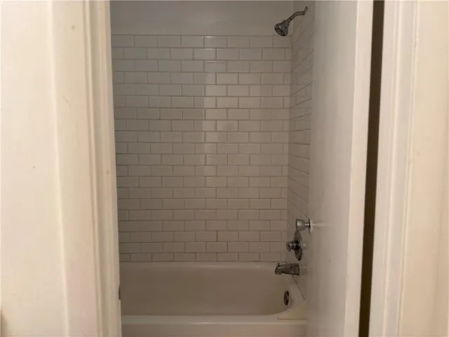 a close up of a bathtub