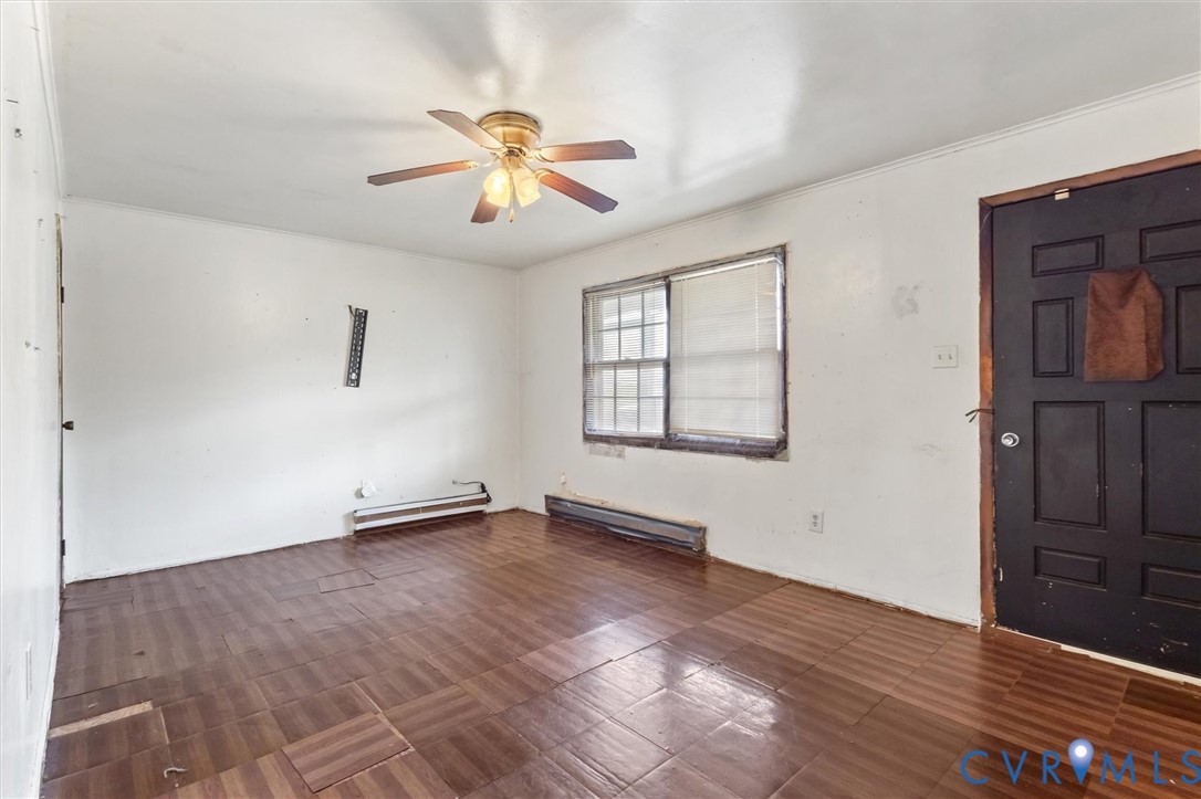 6436 Macedonia Road Woodford, VA 22580 - Photo 4 of 12 Entryway featuring baseboard heating, ceiling fan,
