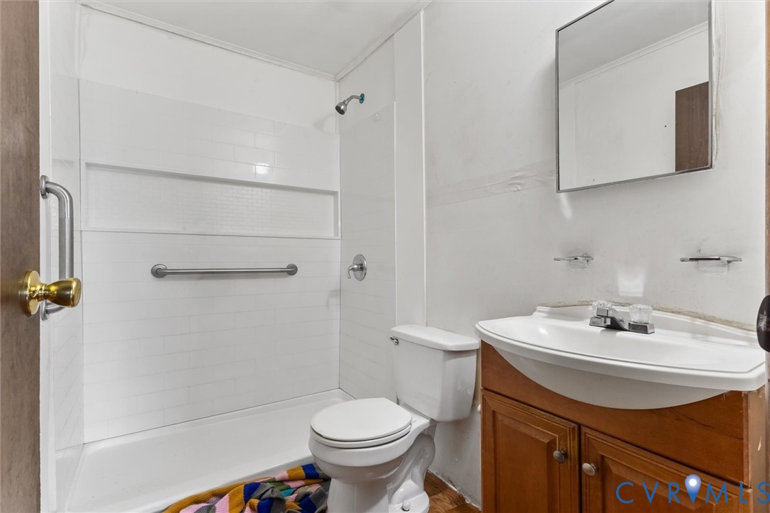 6436 Macedonia Road Woodford, VA 22580 - Photo 10 of 12 Full bath featuring vanity and a stall shower