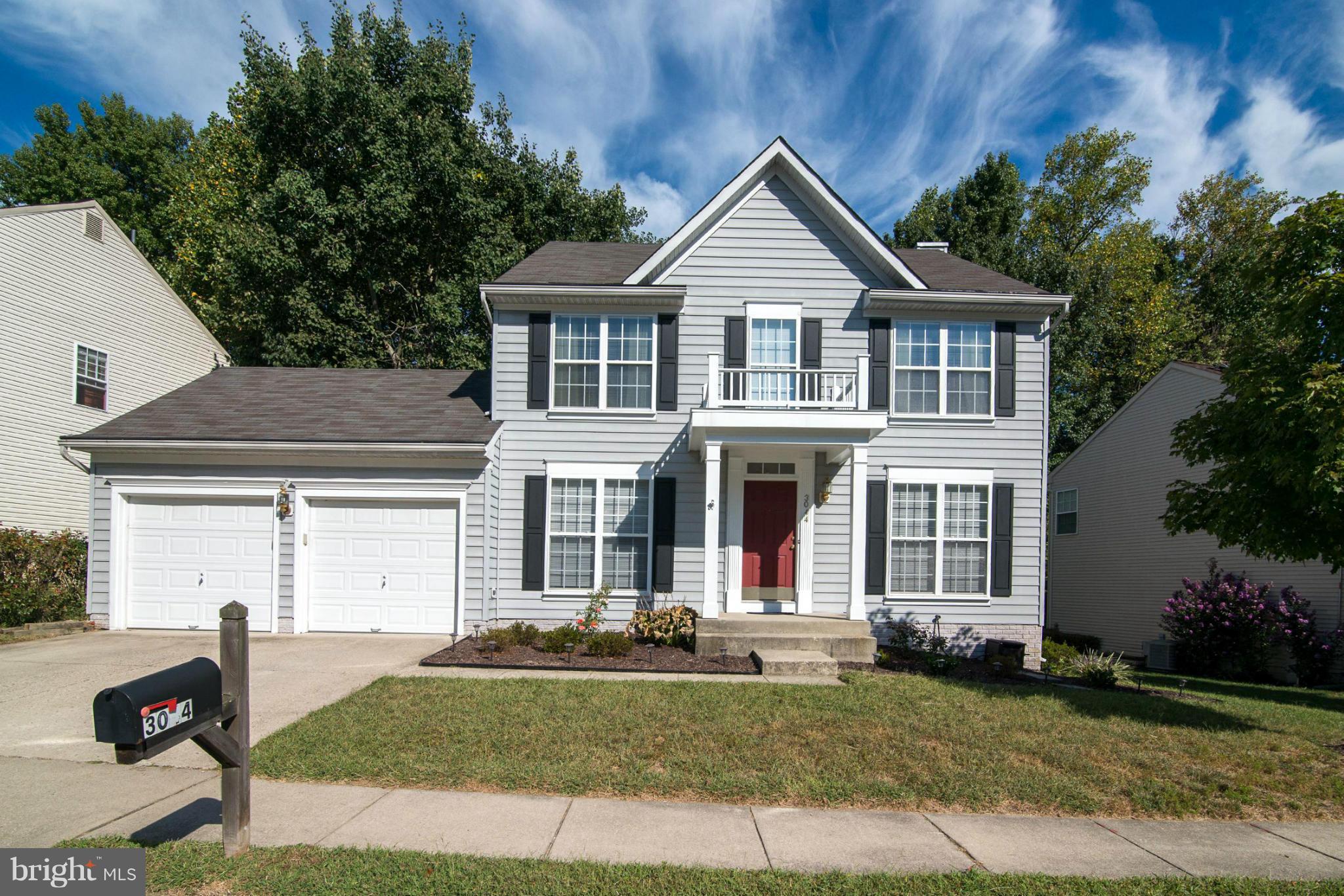 3044 Shoreline Boulevard Laurel, MD 20724 - Photo 1 of 13 a front view of a house with a yard