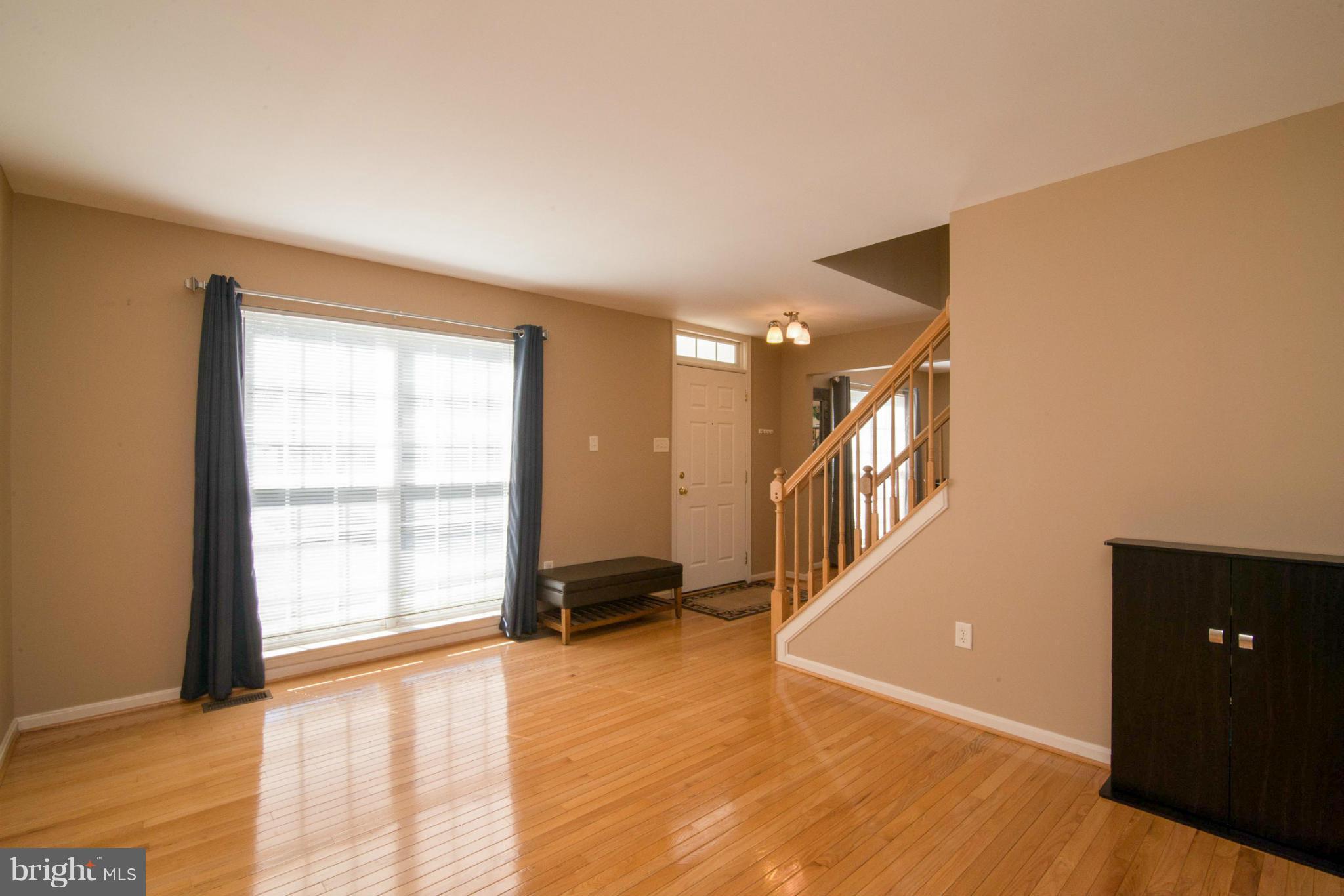 3044 Shoreline Boulevard Laurel, MD 20724 - Photo 4 of 13 a view of an empty room with window and a livingroom