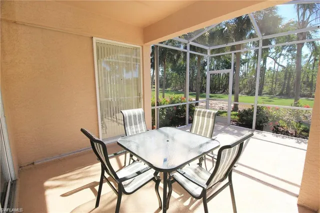 a view of a dining room with furniture wooden floor and outer view