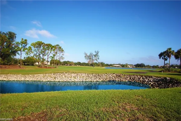 a view of a swimming pool and an ocean