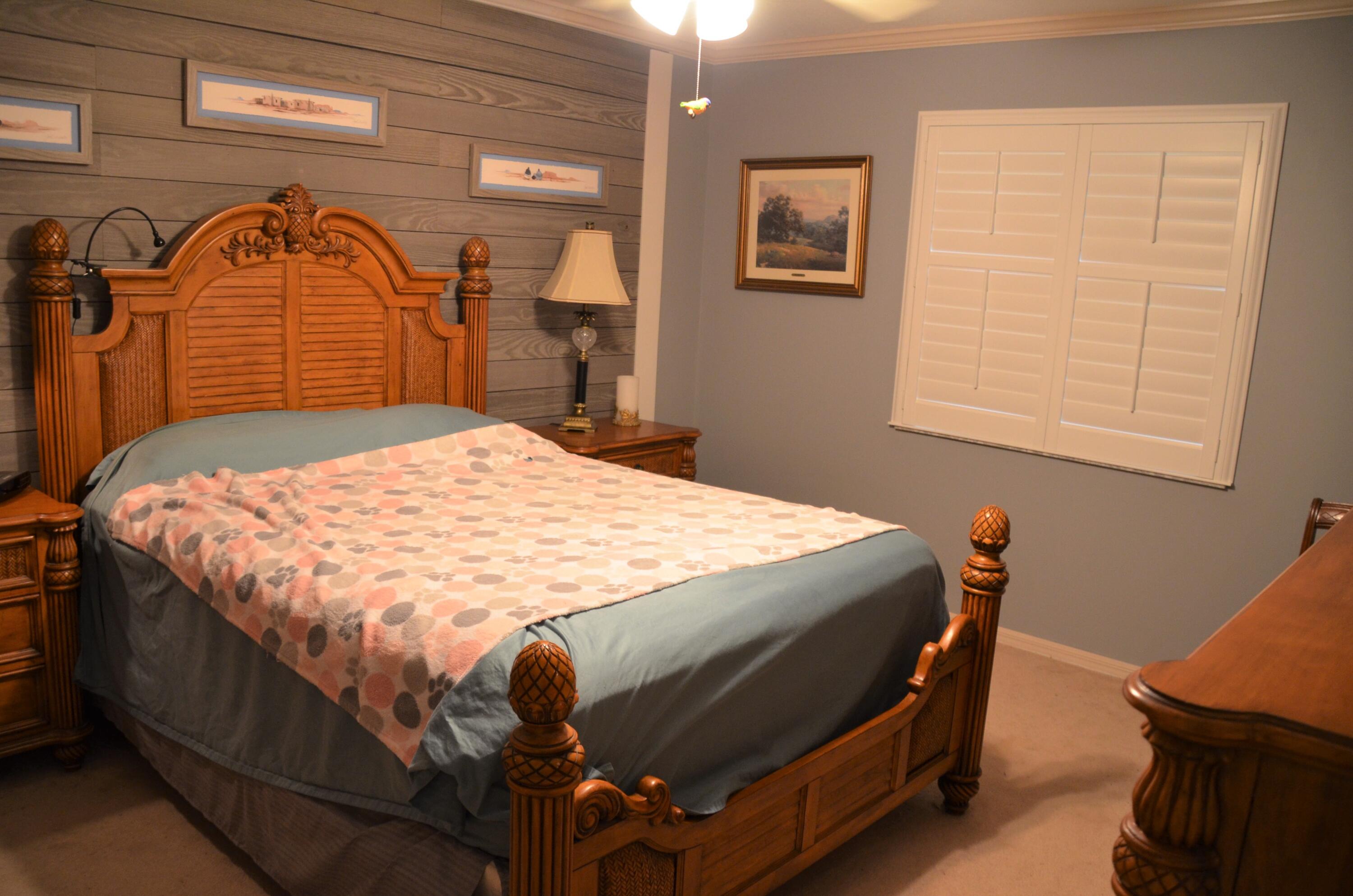 6751 Southeast Raintree Avenue Stuart, FL 34997 - Photo 17 of 19 Primary Bedroom
