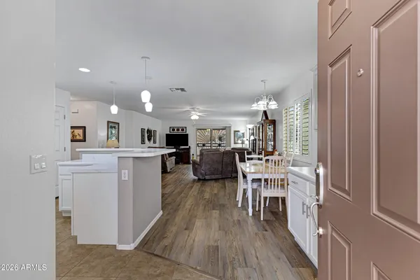a view of a kitchen and dining room
