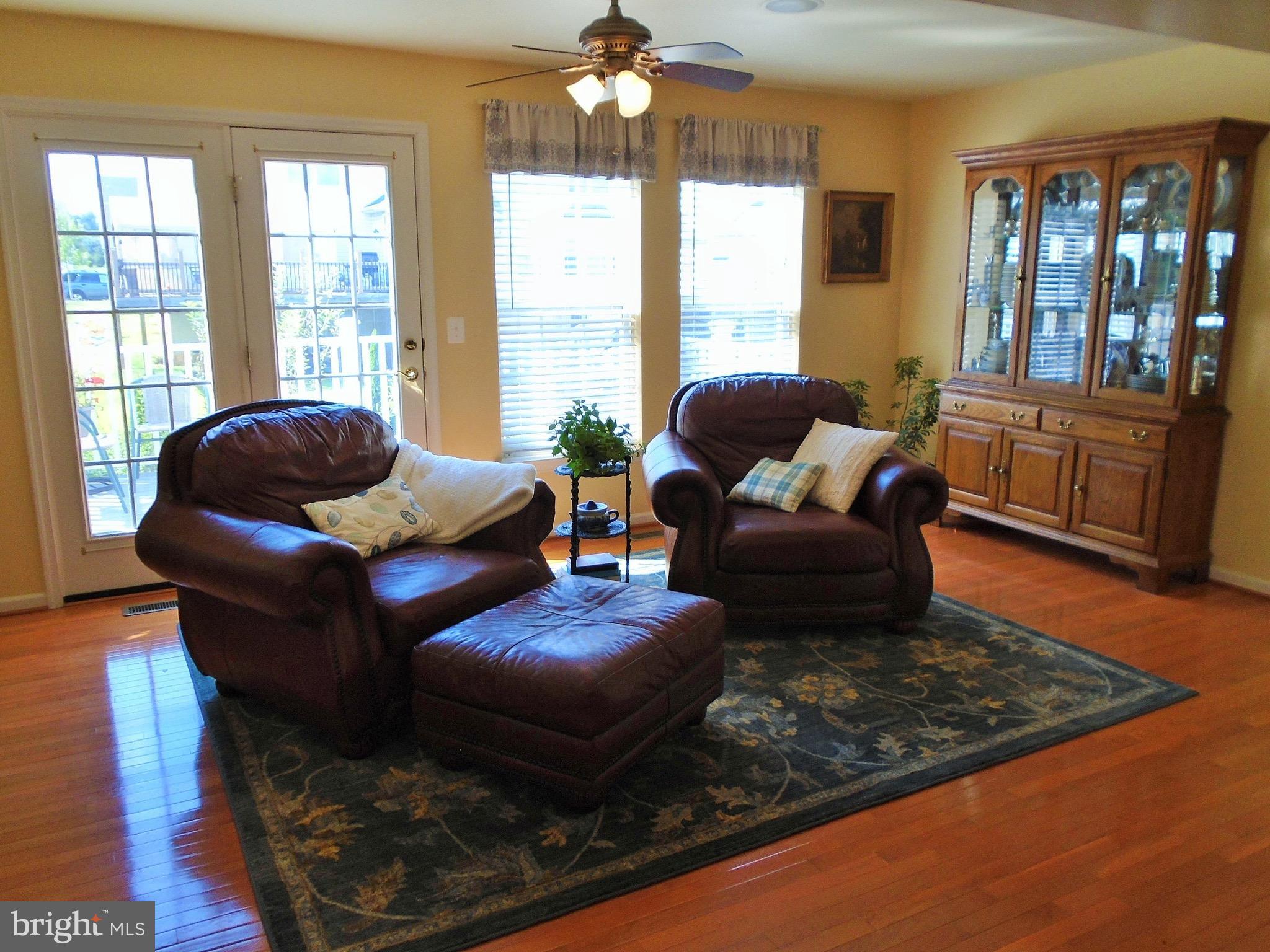 1243 Steed Street Ranson, WV 25438 - Photo 14 of 29 a living room with furniture and a large window