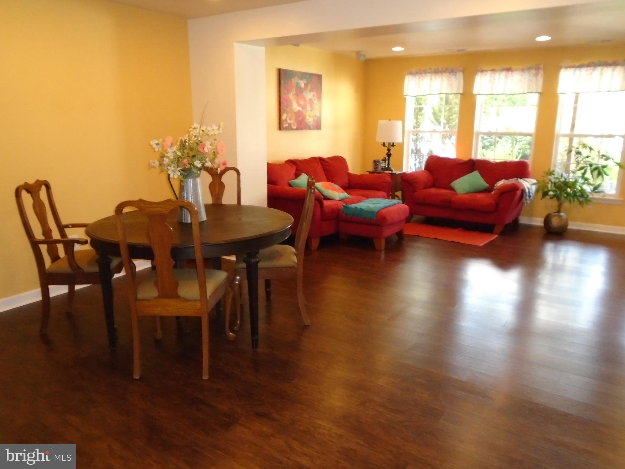 1243 Steed Street Ranson, WV 25438 - Photo 4 of 29 a living room with furniture and wooden floor