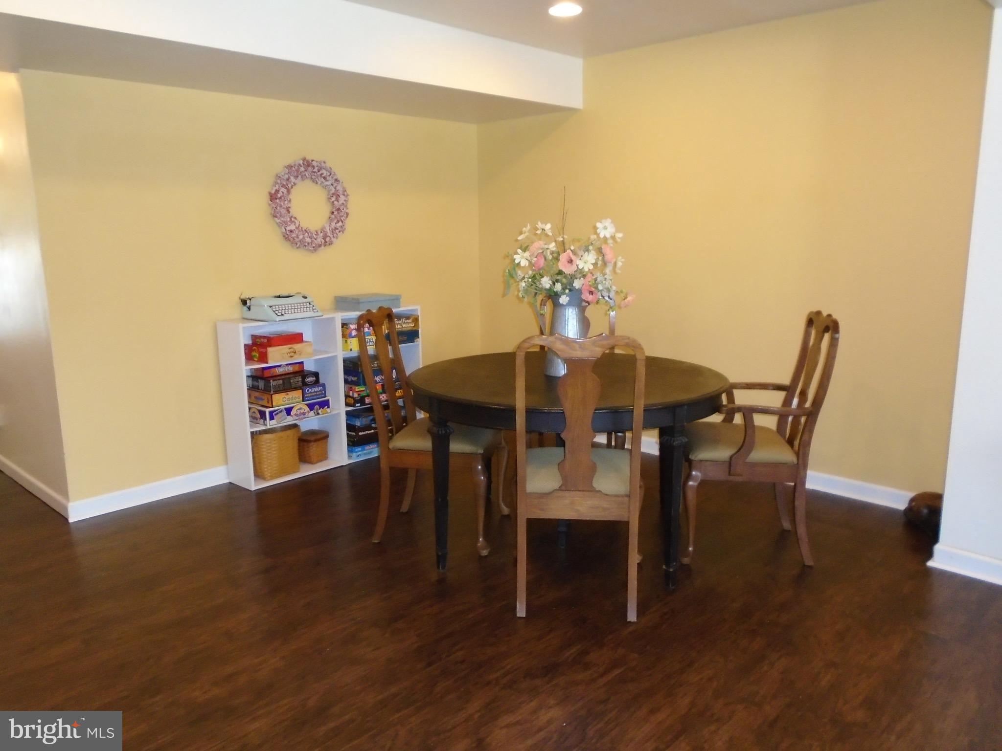 1243 Steed Street Ranson, WV 25438 - Photo 5 of 29 a dining room with furniture and wooden floor