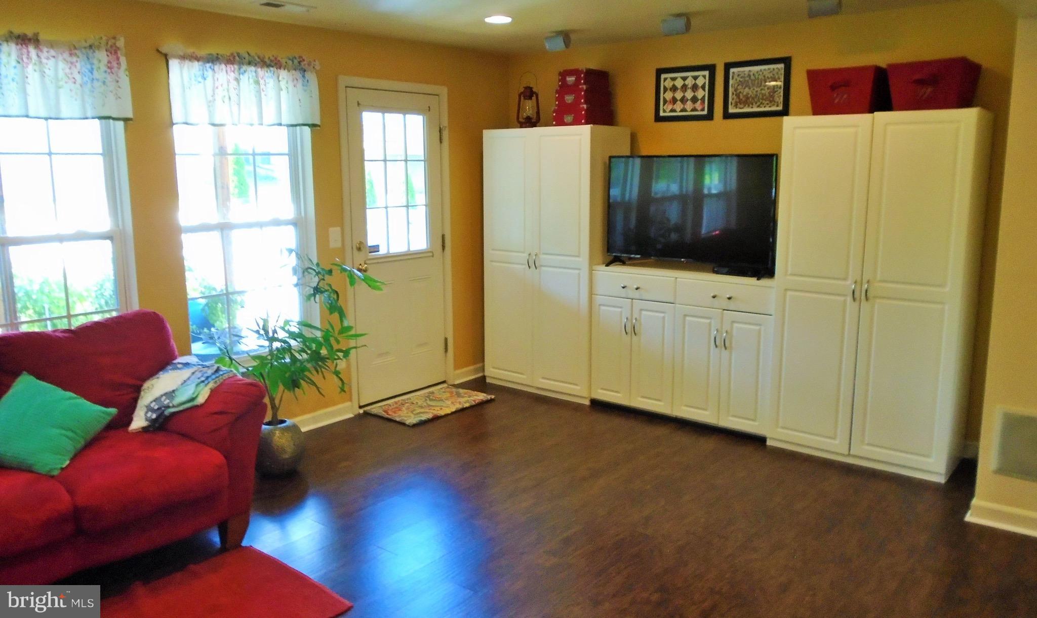1243 Steed Street Ranson, WV 25438 - Photo 7 of 29 a living room with furniture and a large window