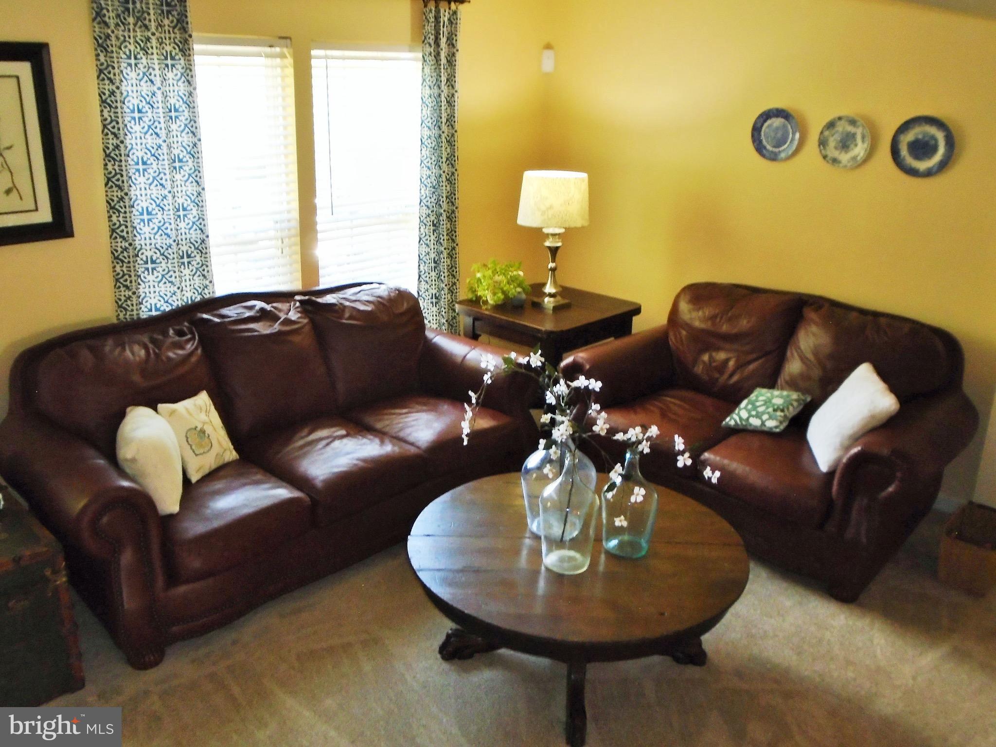 1243 Steed Street Ranson, WV 25438 - Photo 9 of 29 a living room with furniture