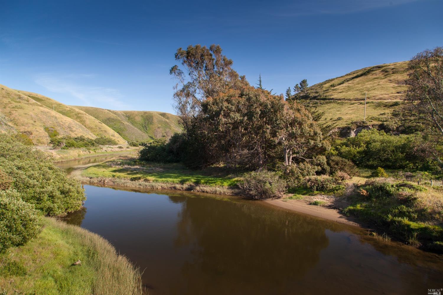 a view of a lake with a mountain