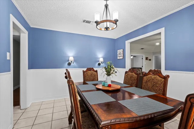 a kitchen with cabinets appliances and a counter top