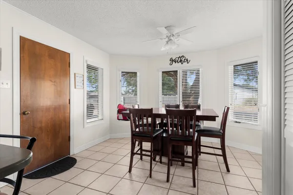 a kitchen with cabinets and stainless steel appliances