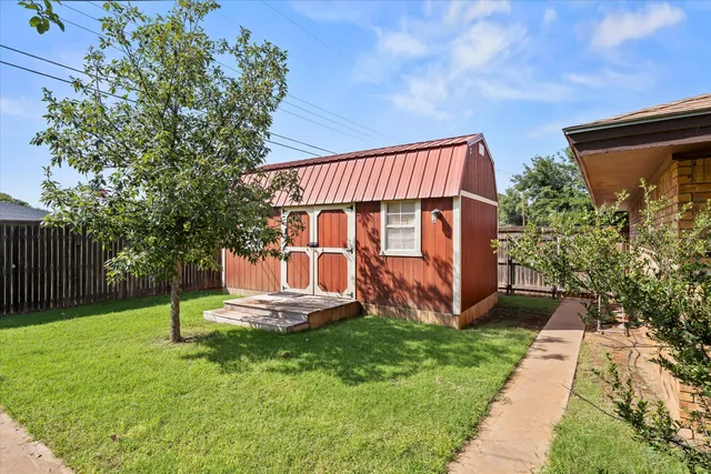 a view of outdoor space and yard