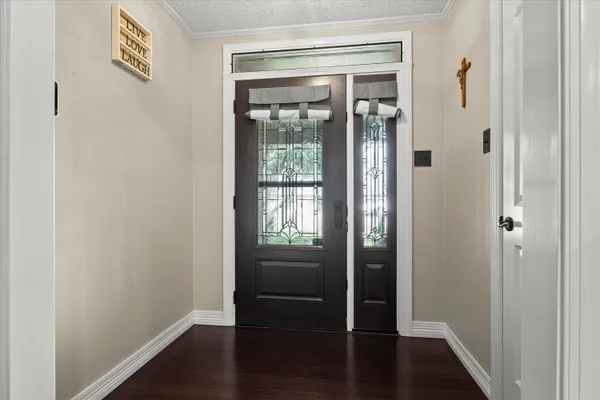 a living room with furniture fireplace and a flat screen tv