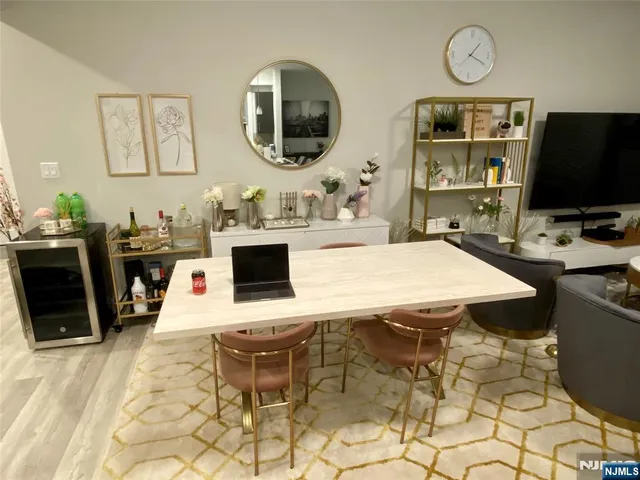 a view of a workspace with furniture