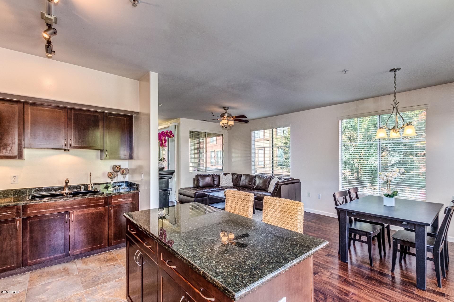 1920 East Bell Road, Unit 1130 Phoenix, AZ 85022 - Photo 13 of 47 Kitchen opens to Dining & Great Room