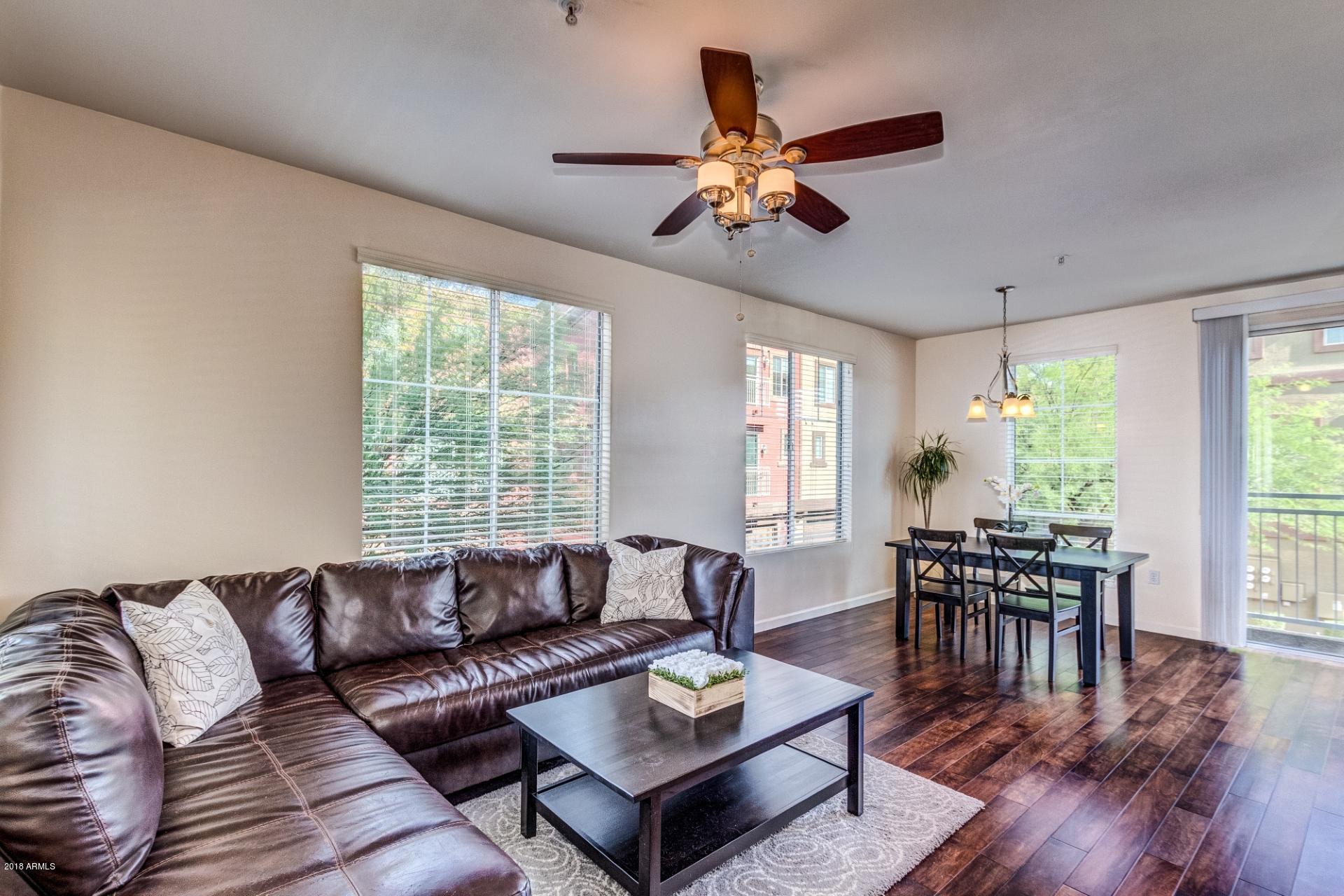 1920 East Bell Road, Unit 1130 Phoenix, AZ 85022 - Photo 2 of 47 Great Room opens to Dining& Kitchen