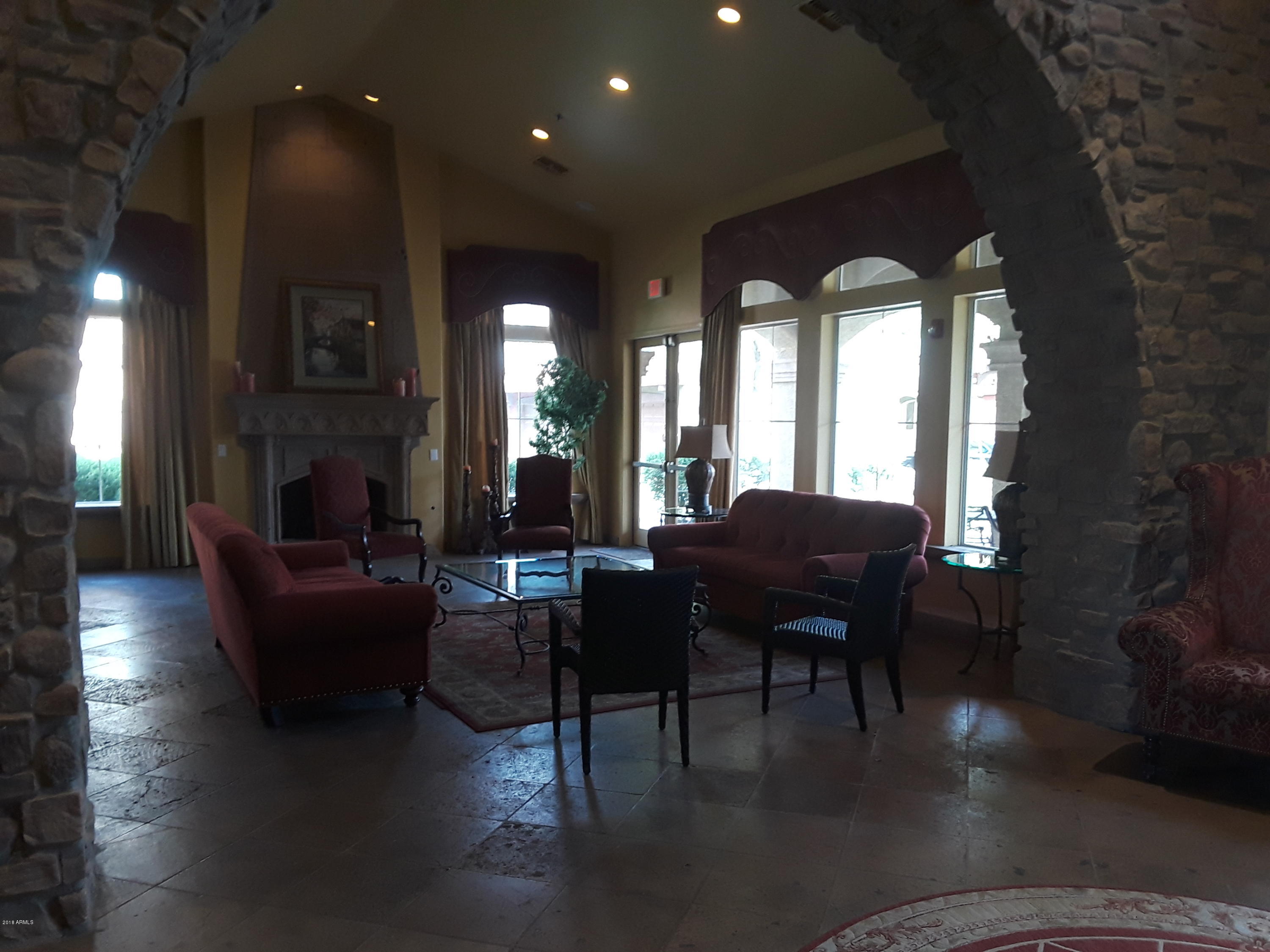 1920 East Bell Road, Unit 1130 Phoenix, AZ 85022 - Photo 38 of 47 Clubhouse fireplace