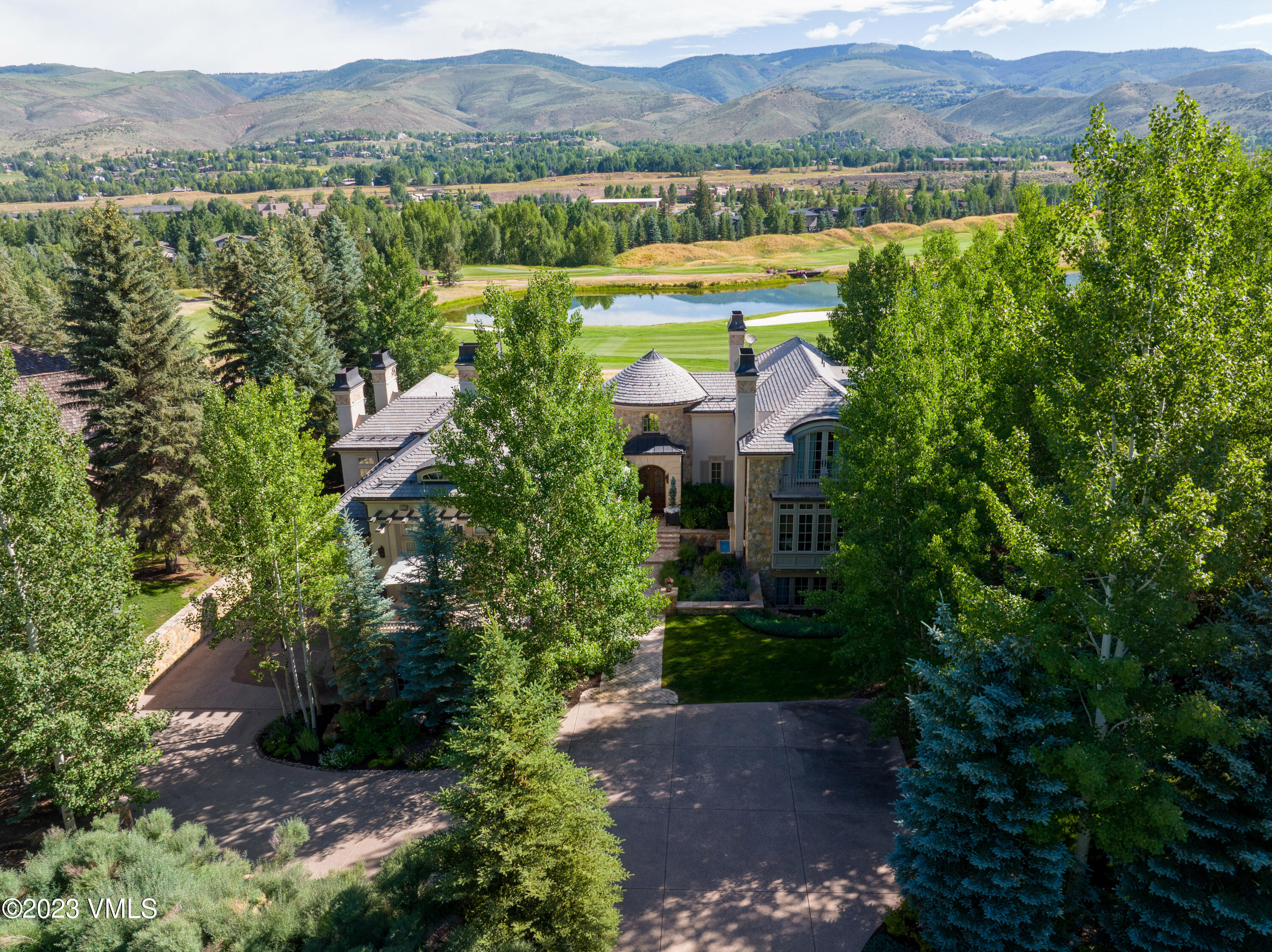 155 Arrowhead Drive Edwards, CO 81632 - Photo 26 of 45 a view of a lake with a mountain