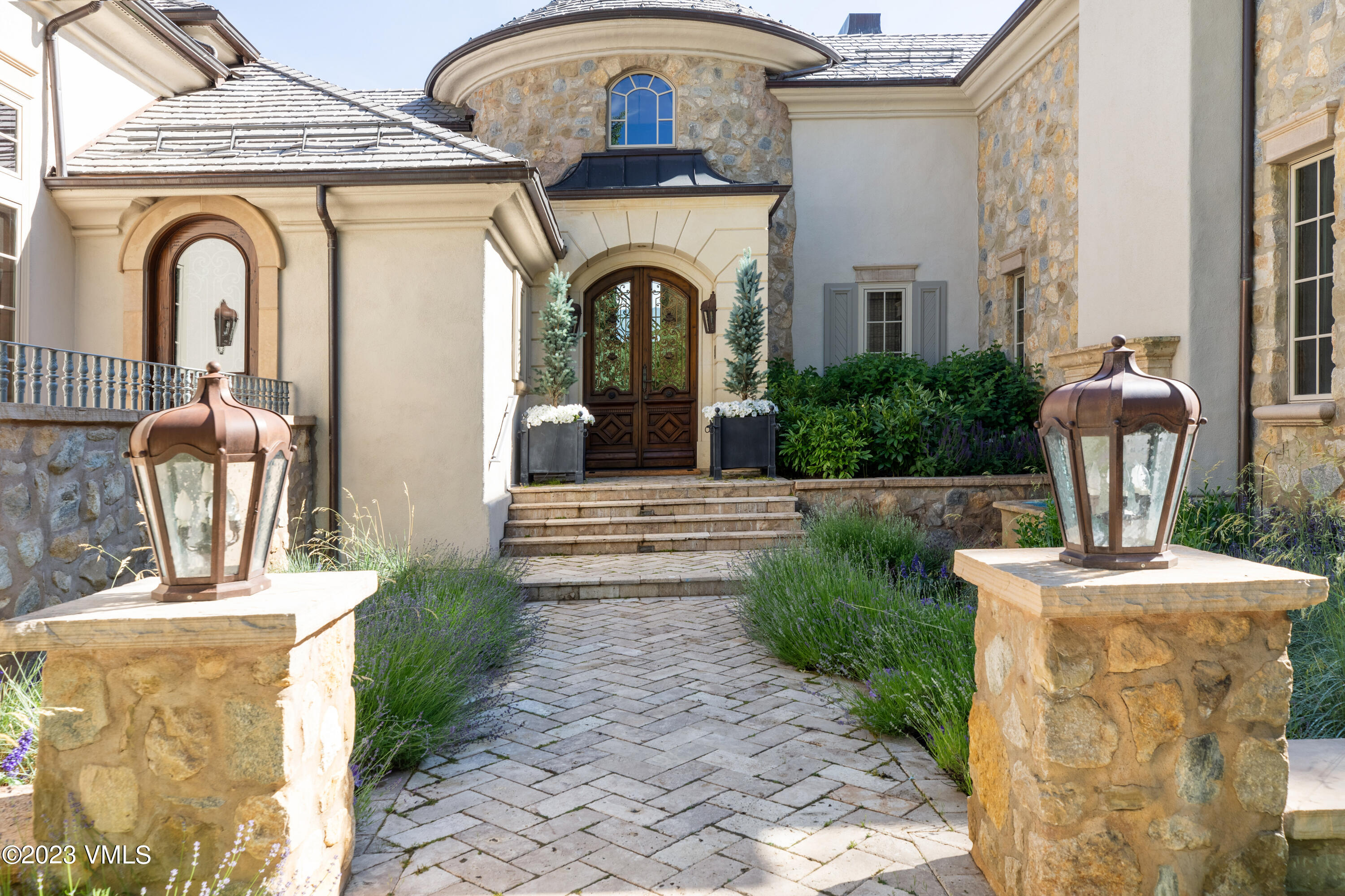 155 Arrowhead Drive Edwards, CO 81632 - Photo 27 of 45 a front view of a house with garden