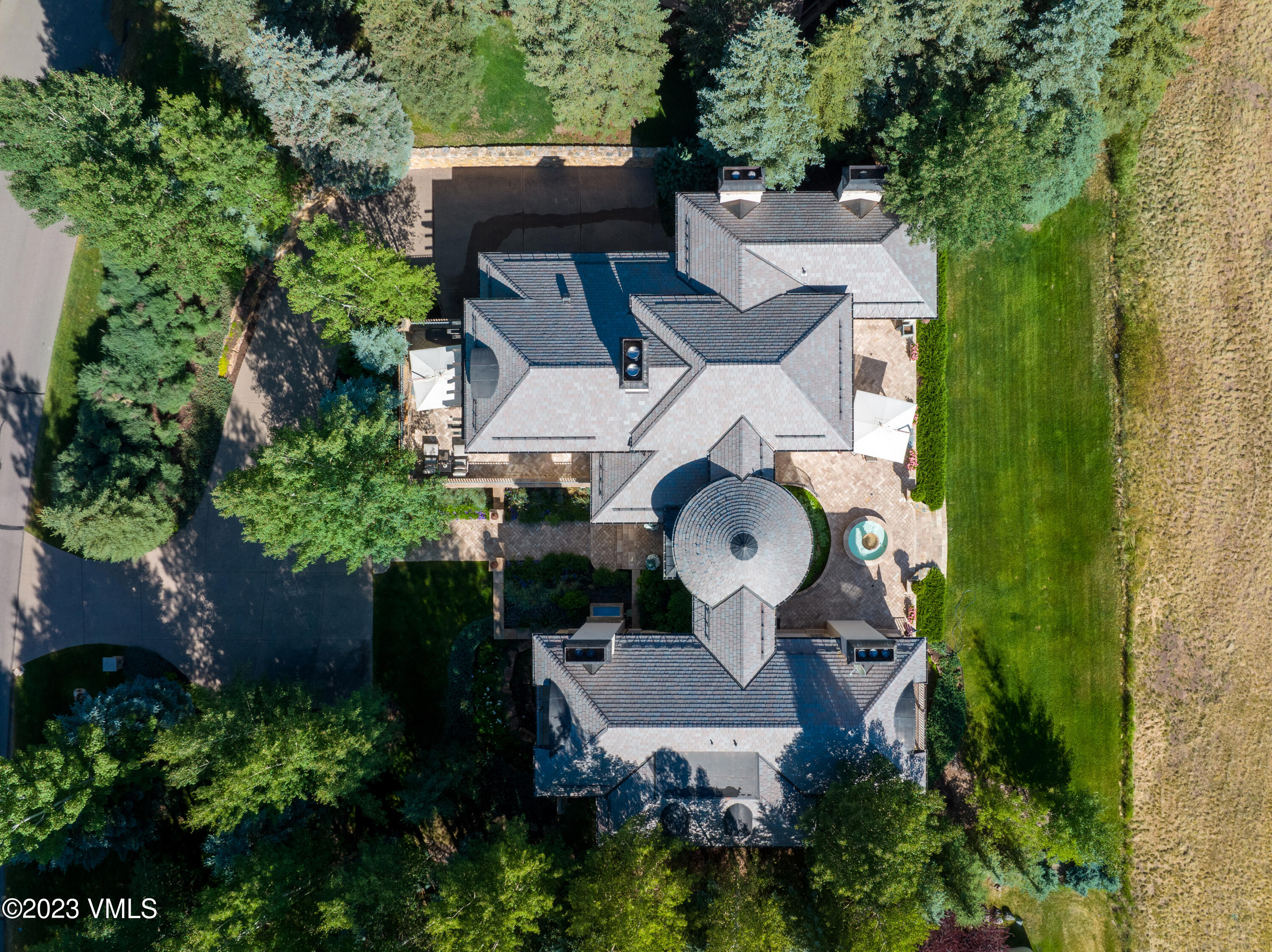 155 Arrowhead Drive Edwards, CO 81632 - Photo 30 of 45 an aerial view of a house with outdoor space pool seating area and yard