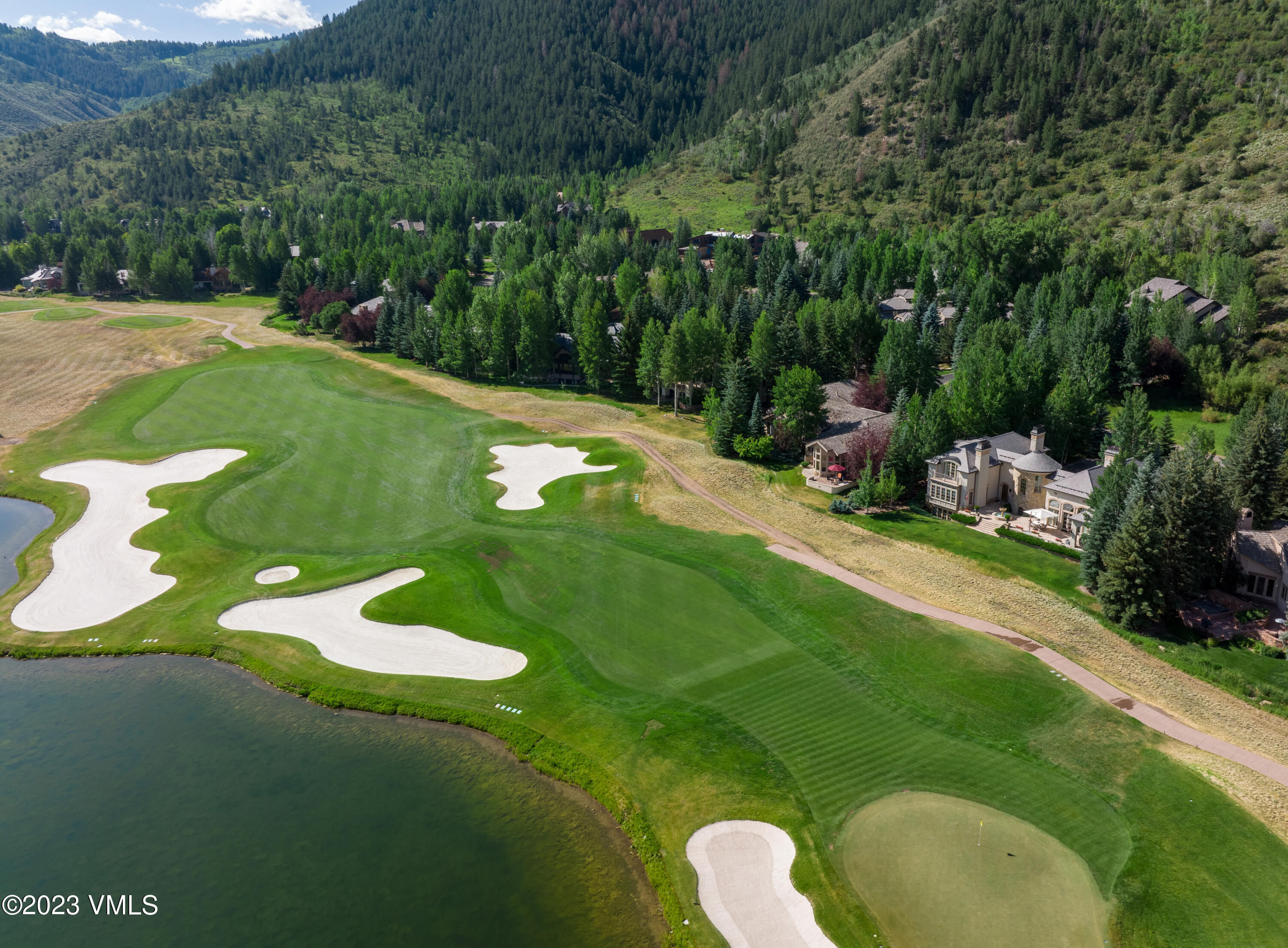 155 Arrowhead Drive Edwards, CO 81632 - Photo 31 of 45 a view of a golf course with a swimming pool