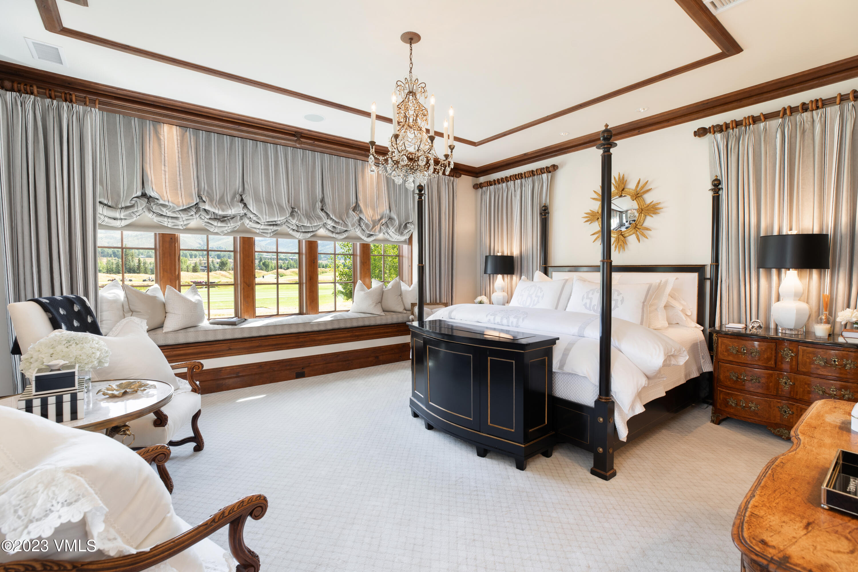 155 Arrowhead Drive Edwards, CO 81632 - Photo 10 of 45 a spacious bedroom with a bed and a large window