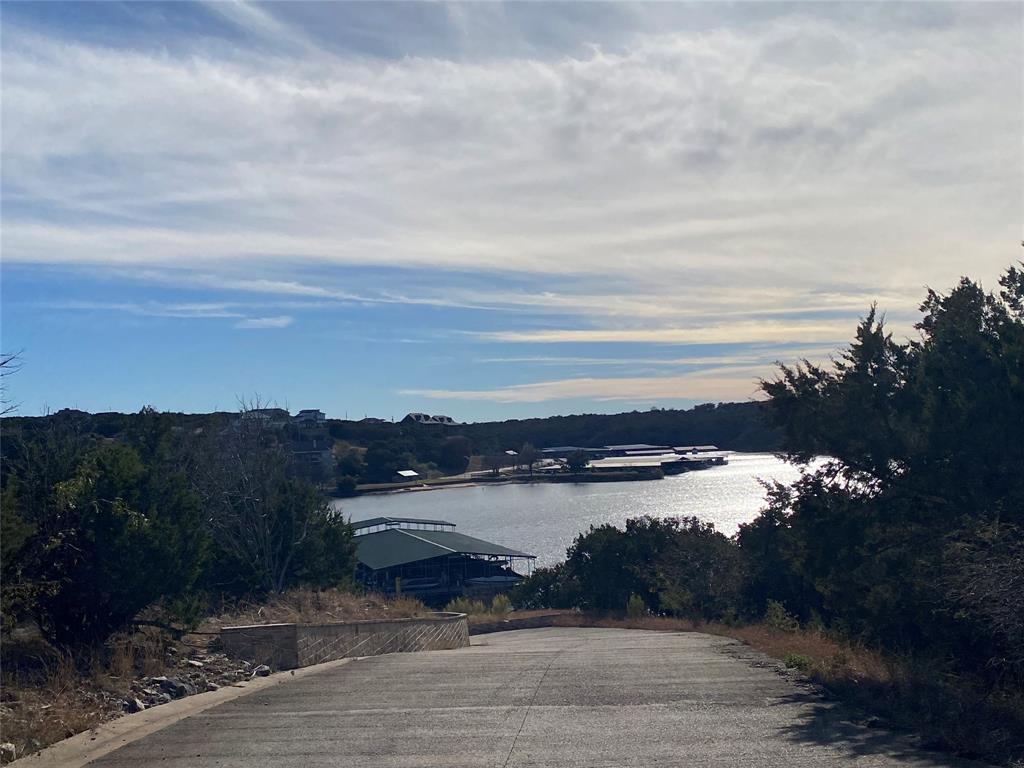 Tbd Rawhide Ridge Graford, TX 76449 - Photo 10 of 12 a view of a lake with houses in the back