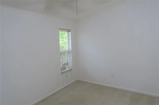 a bathroom with a glass door